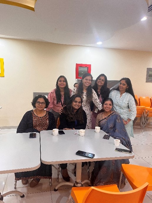 A group of CloudMoyo employees smiling at the camera as they celebrate International Women's Day 2023.